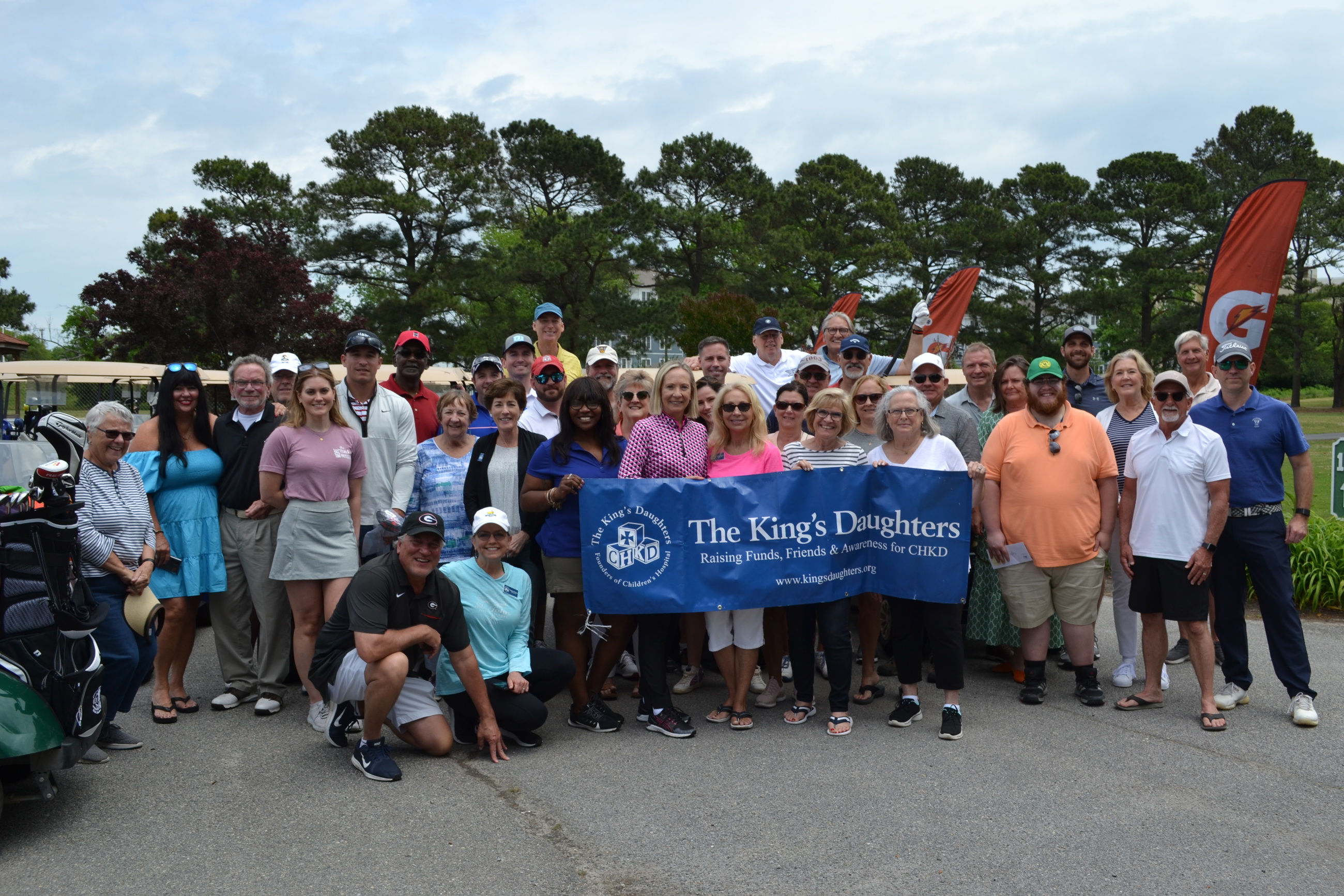 Group of Golfers and Volunteers